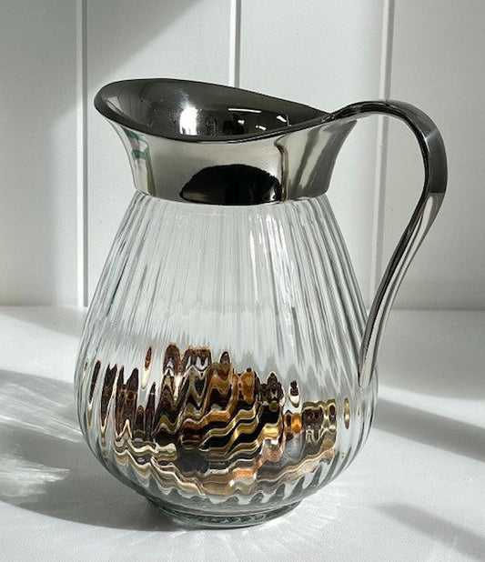 63F - Large Round Ribbed Glass Jug