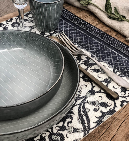 Beija Flor placemats will add a touch a sophistication to your table setting, the stylish matte print designs are inspired by beautiful antique ceramic tiles. 
Super versatile; as they are ideal for using indoor & outdoor, sit flat to use, and feel lovely to touch.Made from high quality vinyl, these placemats are easy to clean, with just a cloth and soapy water.Designed and made in Israel