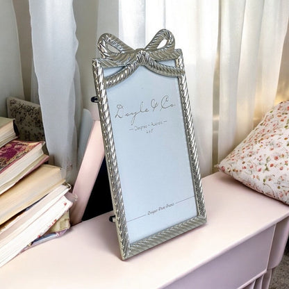 189K Silver Flowing Bow Frame 4X6