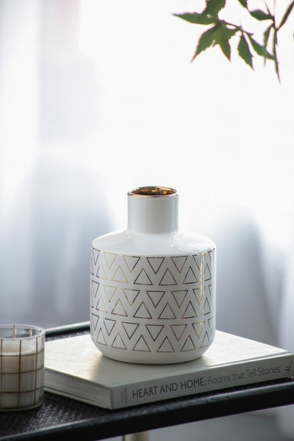 Geo Vase 20 Cms High Indoor/Outdoor. Our Geo Vase Small  With A Gloss White Finish And Gold Trim
