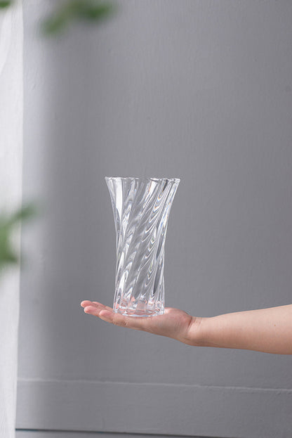 Clear Glass Curved Column Vase 20Cmh. Spiral Pattern That Easily Complements Arrangements Of Foliage And Flowers