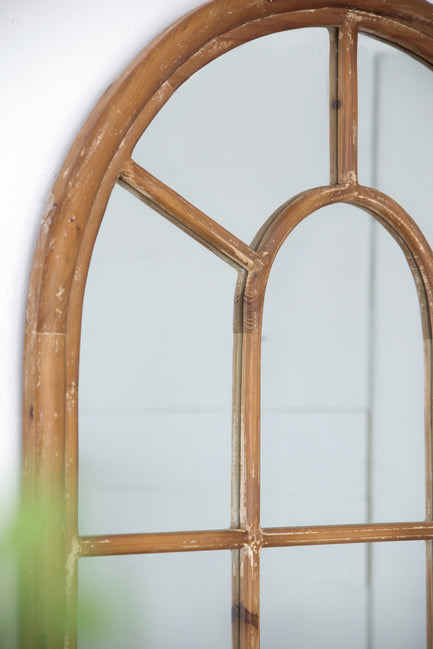 Coolum Arched Wall Mirror. This Decorative Wall Mirror Boasts An Oversized Arched Silhouette And A Natural Brown Frame