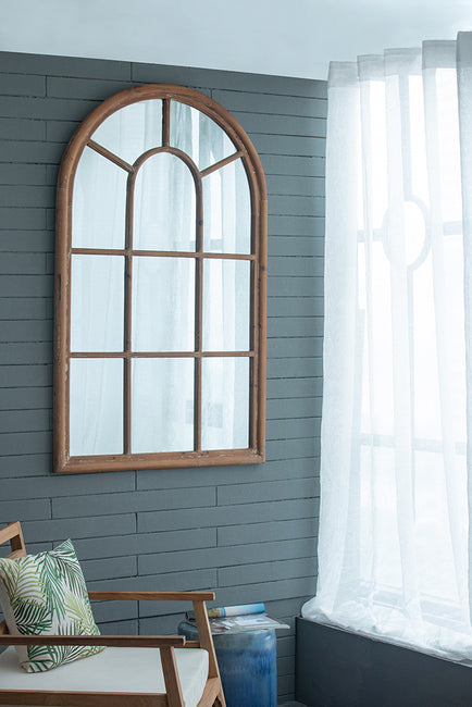 Coolum Arched Wall Mirror. This Decorative Wall Mirror Boasts An Oversized Arched Silhouette And A Natural Brown Frame